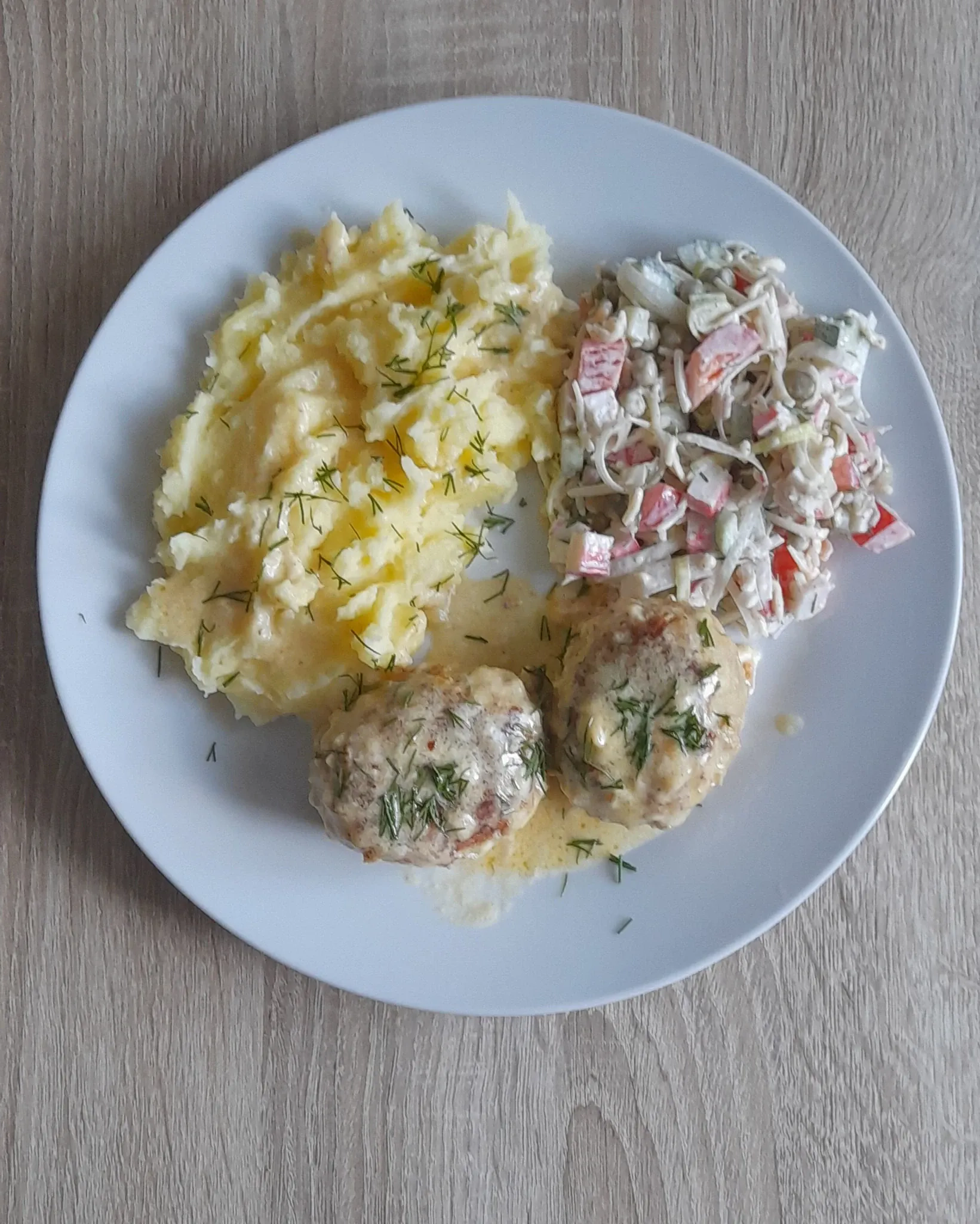 Kiaulienos kukuliai su perlinėmis kruopomis padaže